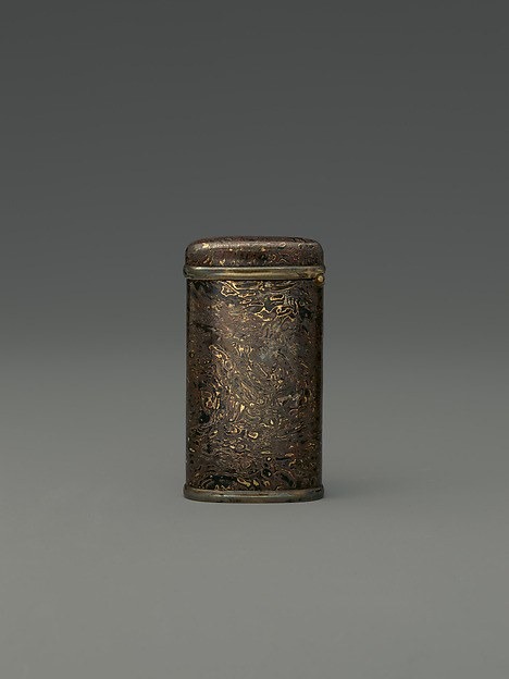 Front view of a mixed-metal Aesthetic Movement match case